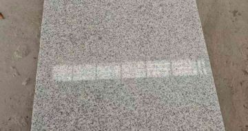 三亚芝麻白光面毛板