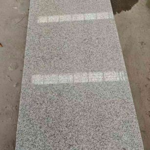 三亚芝麻白光面毛板